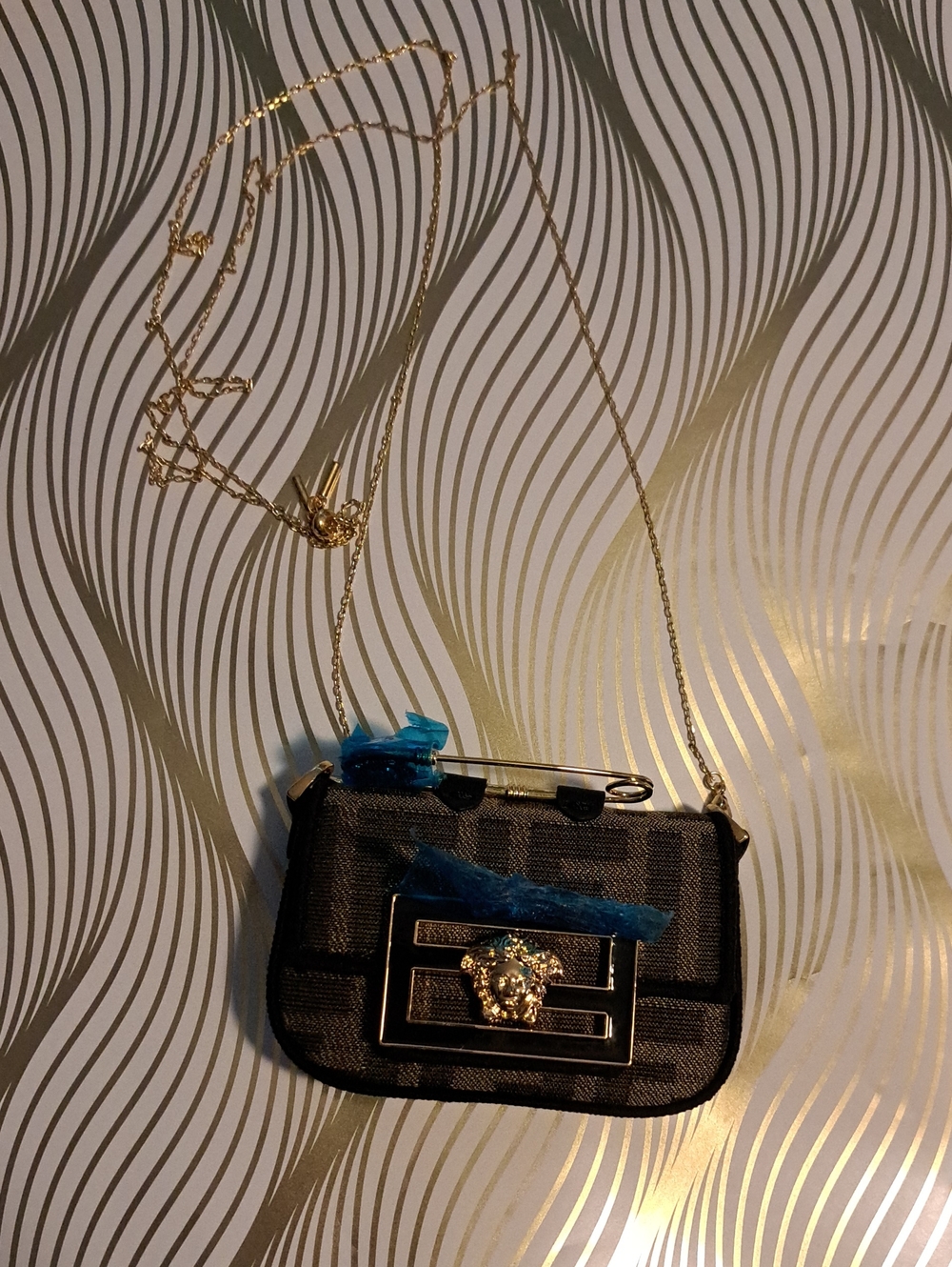 Black Women's Mini Chain Shoulder Bag with Gold Medallion